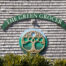 The Green Grocer logo on front of store